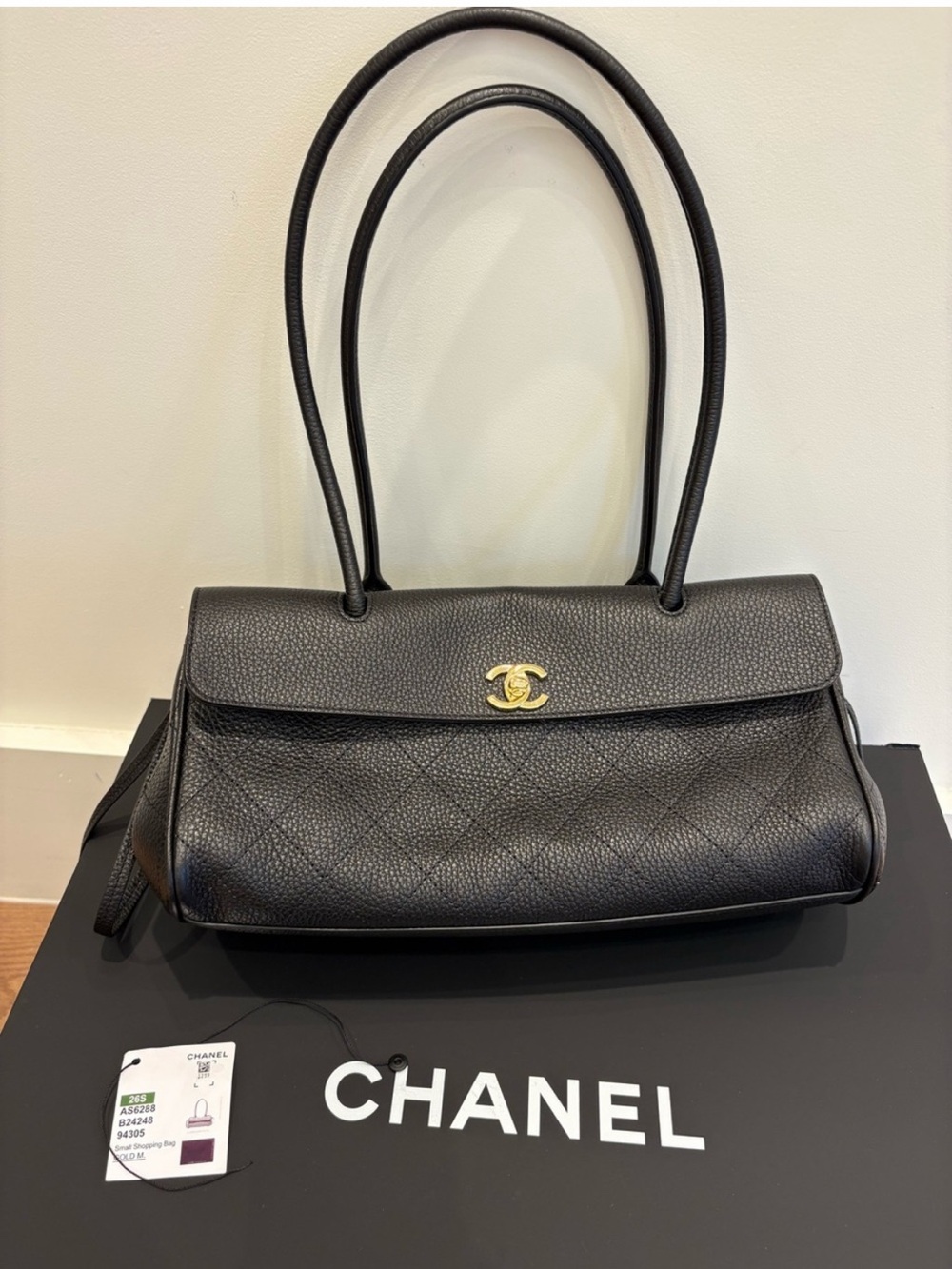 CHANEL Black Quilted Shoulder Bag with Gold CC Turn-Lock